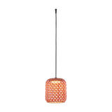 Nans S/21 Outrack pendant light with a cylindrical woven red lattice shade on a long black suspension cord, shown illuminated against a plain white background.