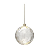 Murané 15cm transparent glass sphere pendant light with rippled surface, integrated LED, and Brushed Champagne cap, hung on a fine cable against a plain white background.