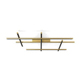 Hilow LED ceiling light with crossing linear bars in brushed brass finish and black diffuser frames, forming an architectural grid on a plain white background.