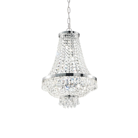 The Silhouette Crystal 6 Light Chandelier - Chrome features a tiered design suspended from a metal chain. Its chrome finish, combined with cascading crystal elements and a metallic frame, radiates an elegant and luxurious appearance.