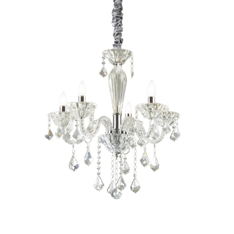 The Nimble Crystal 5 Light Chandelier in chrome exudes luxury with its five candle-like lights and cascading crystal prisms, all hanging elegantly from a decorative wrapped cord. It seamlessly combines classic elegance with a modern touch.