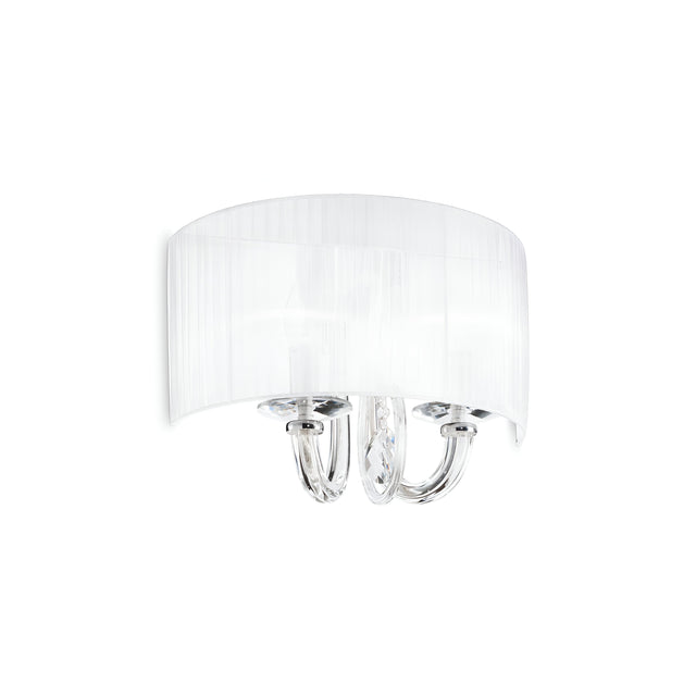 Introducing the Blossom Wall Light - White, a contemporary wall sconce showcasing a curved, translucent white shade paired with sleek metal arms beneath. Accented with crystals for added elegance, this minimalist design includes a dimmable feature ideal for modern interior spaces.