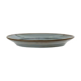 Side view of the Pixie Stoneware Dinner Plate in blue, showing a wide flat rim, sunken centre, and reactive glaze finish on a plain white background.