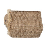 Harrison Basket in beige woven bankuan grass, shaped like a lion with a domed face and shaggy fringed mane, rectangular open-top body, on a plain white background.