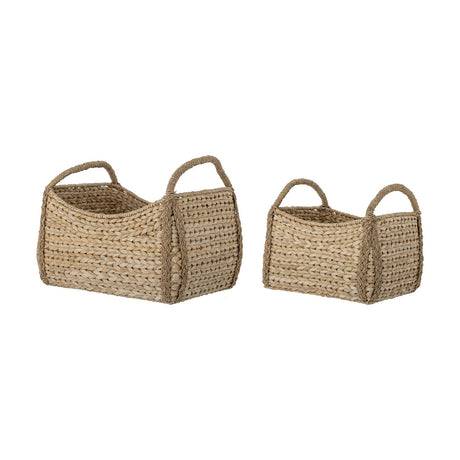 Selma Baskets Set of 2 in beige bankuan grass, rectangular bodies with loop end handles and braided corner trim, shown in two sizes on a plain white background.