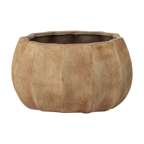 Conja Terracotta Plant Pot in brown, a wide low planter with a pumpkin-style gathered body, vertical panels, and a gently waved rim, shown on a plain white background.