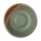 Paula Stoneware Bowl 16cm in green, shown from above with a reactive glaze and a diagonal terracotta band with speckled texture along one edge, on a white background.