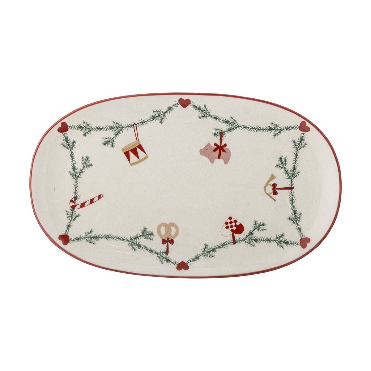 Yule Oval Stoneware Christmas Platter in cream, featuring a pine sprig garland with hearts, drum, pig, horn, candy cane and pretzel motifs, edged in red, on a white background.