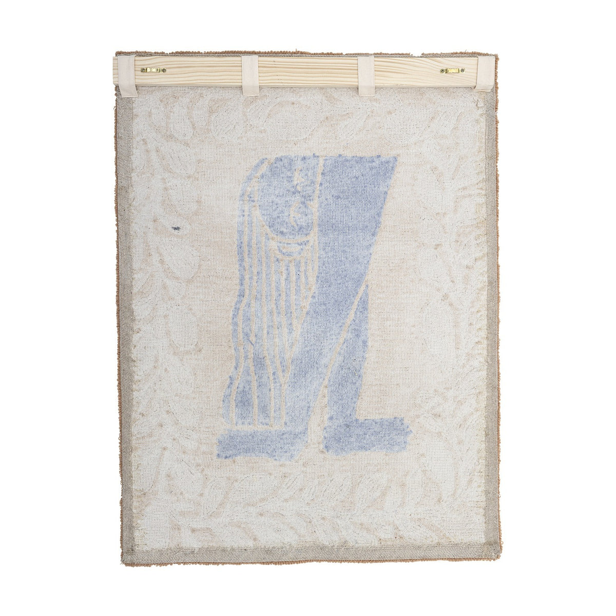 Atle Wool Wall Decor in multi, a woven wool tapestry with a blue figural motif bordered by a leafy sprig pattern, hung from a wooden rod on a white background.