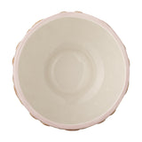Top-down view of the Binna Heart stoneware Christmas bowl in pink, showing the cream glazed interior and pink rim against a white background.