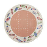 Caramella Stoneware Christmas Dinner Plate with a peach centre, white dotted grid pattern, and a rim of multicoloured striped and spotted wrapped sweets, shown on a white background.