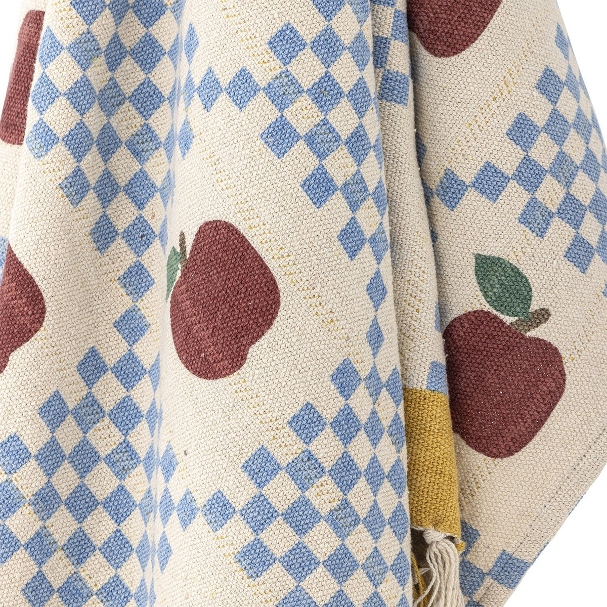 Gala Cotton Throw in Multi, a cotton throw woven with burgundy apples and blue checked panels on cream, with a mustard yellow border and knotted fringe.
