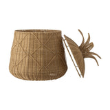 Anann Pineapple Basket with Lid in beige polyrattan, rounded woven body with diamond pattern and lid featuring leaf-shaped spray, shown open beside the basket on a white background.
