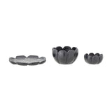 Reiko flower-shaped black marble tealight holders set of 3, featuring a petal-edged tray and two graduated petal bowls, shown on a white background.