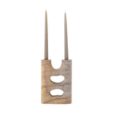 Lodi Marbled Sandstone Candle Holder in beige with two upright arms holding taper candles, a rounded central notch, and two pebble-shaped cut-through openings, shown on a plain white background.