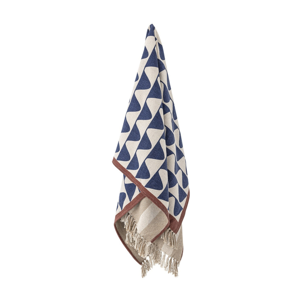 Rimme Cotton Throw in multi hangs against a white background, showing a navy and cream geometric wave pattern with a rust-coloured border and knotted fringe.