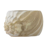 Corelia Shell Stoneware Plant Pot in beige, shaped like a seashell with a spiral whorl and ribbed body, shown on a plain white background.