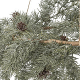 Close-up of the Cedar Artificial Christmas Wreath 70cm in green, showing frosted faux pine needles, small brown cones, and a twine-wrapped branch against a white background.