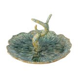 Litton Round Stoneware Tray in green, a leaf-shaped ceramic dish with ribbed, scalloped edges and a central branch-like ring holder, shown on a white background.