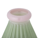 Close-up of the Judith ribbed glass vase in green, showing the pink rounded rim and vertical ribbed texture tapering into the neck, on a plain white background.
