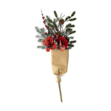 Rubia Artificial Christmas Bouquet in red, featuring large faux flowers, pine sprigs, pinecones and red berry clusters, stems wrapped in kraft paper, shown against a plain white background.