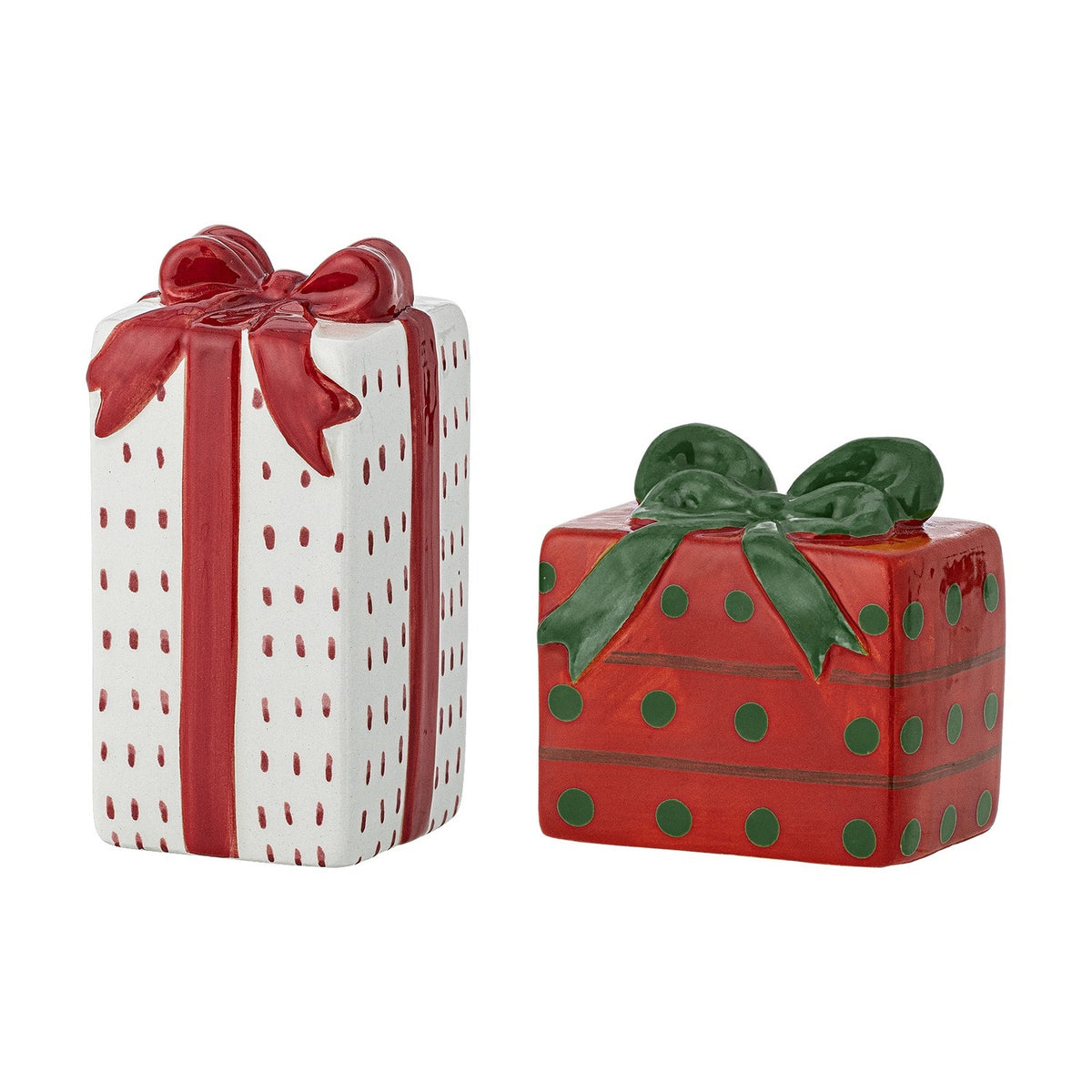 Marnia ceramic salt and pepper shakers shaped as gift boxes, one tall white box with red dashes and bow, one wide red box with green dots and bow, on a white background.