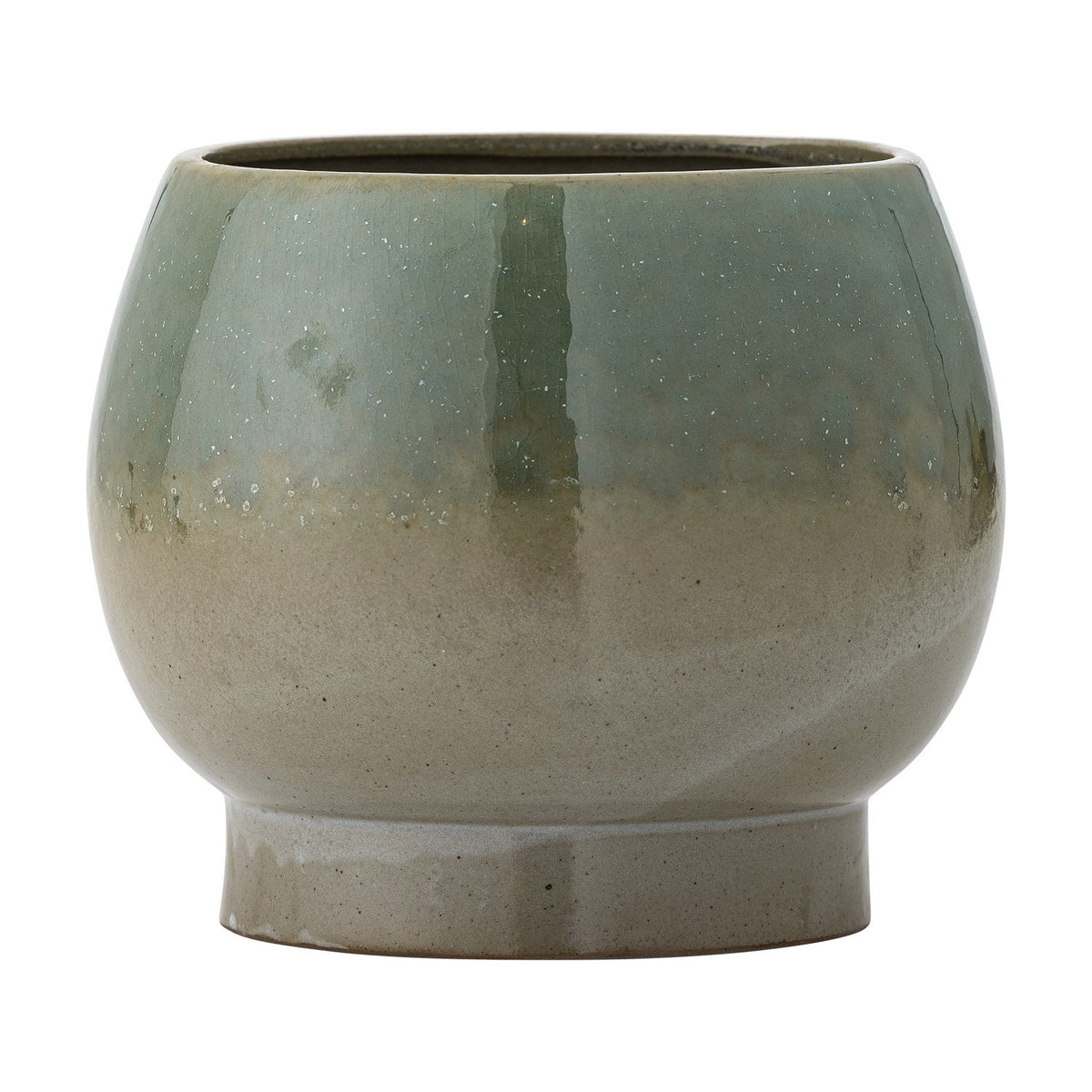 Imke stoneware plant pot with rounded body on a short footed base, finished in a green reactive glaze that fades to beige, shown on a plain white background.