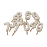 Alfi Birthday Decoration numbers 0-9 in whitewashed wood on short pegs, each digit cut out with a stick handle, shown on a plain white background.