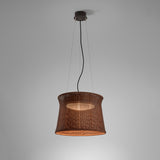 Syra 45 pendant light with a woven brown drum shade narrowing at the waist, suspended on three wires and a central cable from a round canopy, against a plain grey background.
