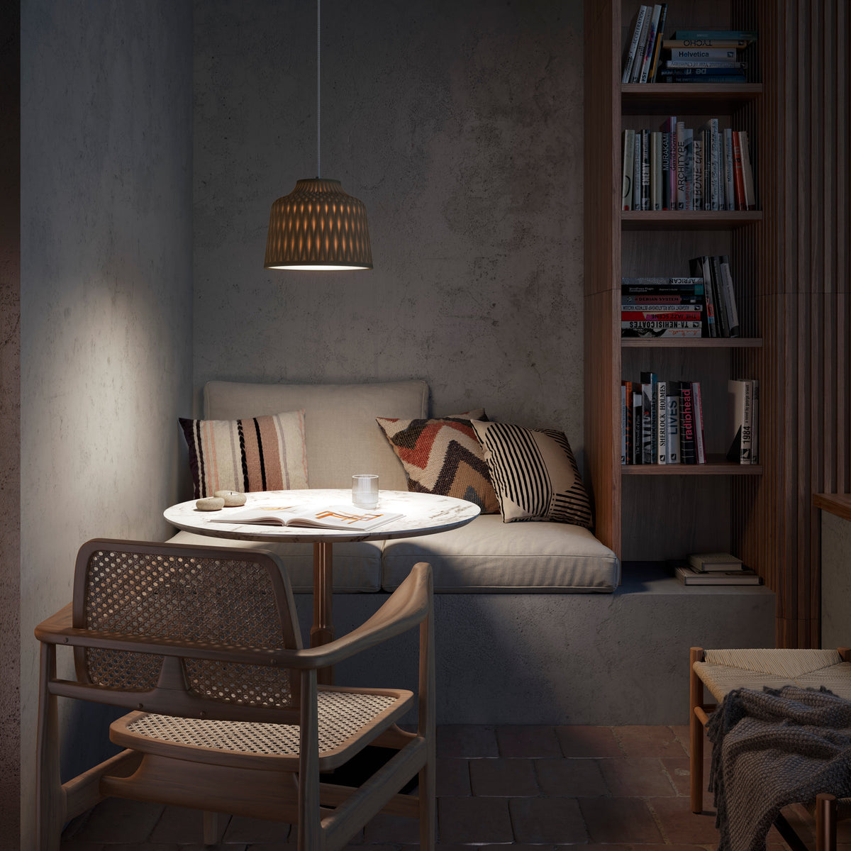 Soft S/30 Bell Outdoor Pendant Light in Olive Grey with textured diamond-pattern shade and white diffuser, shown above a dining table in a living room setting.