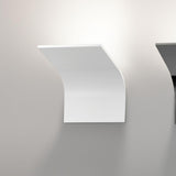 App 2 Light Aluminium LED Wall Light in white, a curved panel fixture mounted on a plain wall, casting soft ambient light upward and across the surface.