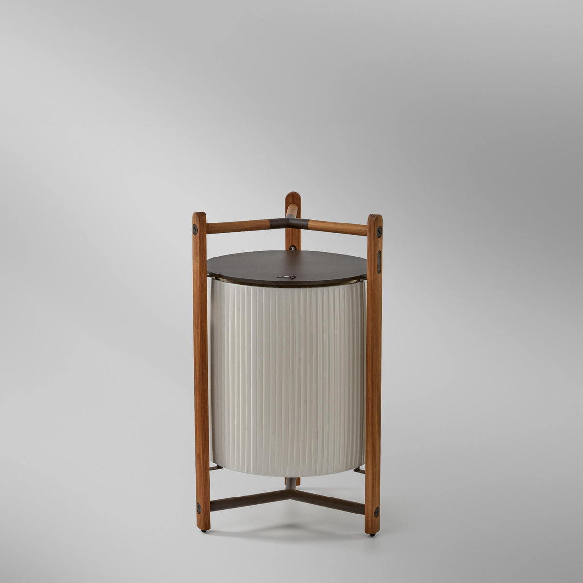 Kando P/76/R rechargeable LED floor lamp with white pleated ribbon shade, round brown top disc, and open three-legged wooden frame on a plain grey background.