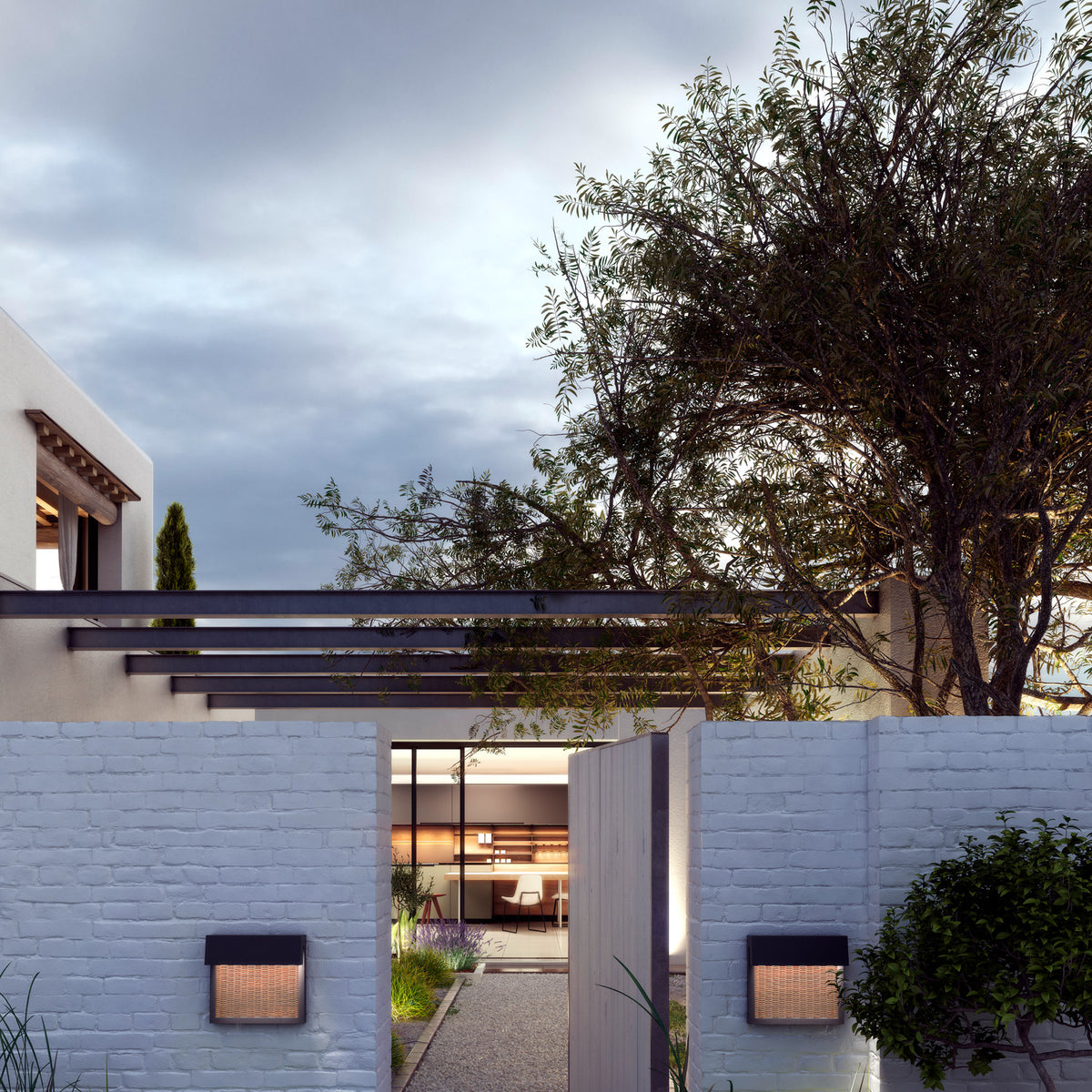 Sisal A/01 LED outdoor wall lights with brown bodies and light beige fibre fronts, mounted either side of a gate set into a white brick garden wall.