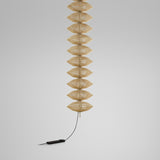 Yuyun S/11L/I pendant light with eleven stacked double-cone beige thread shades on a slim stem, satin beige finish, foot dimmer cord, shown against a plain light grey background.