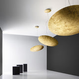 Gong Aluminium Disc LED Pendant Light 60cm in gold leaf finish, shown as large and small textured discs suspended on fine wires from round ceiling canopies in a modern grey and white interior.
