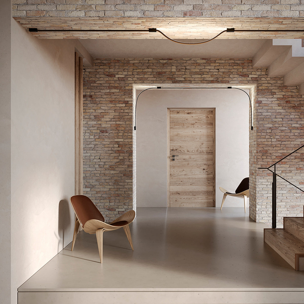 Bow LED Module Kit 50cm installed along ceiling and archway edges in a brick-walled hallway, its slim black profile curving gently where it bridges each opening.