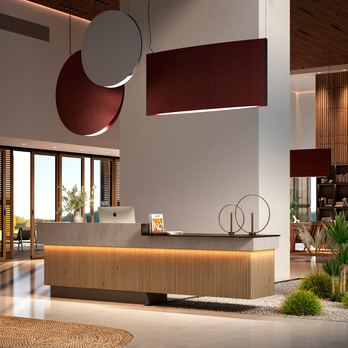 Noren S/100 round fabric disc LED pendant light in Light Grey, shown above a reception desk alongside a matching burgundy rectangular pendant.