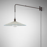 Nans 55 A/98 plug-in wall light with a long swing arm in brown finish and a wide woven cone shade in beige with light blue detailing, shown against a plain light background.