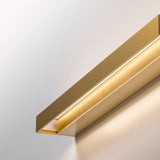 Zero Line Metal Linear LED Wall & Ceiling Light 52cm, brass-finish rectangular bar with recessed warm-white LED strip casting a soft glow, shown at an angle against a plain light background.