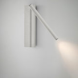 Arid A/03 aluminium LED wall light in Textured White, with a ribbed vertical back plate and an angled slim tube casting warm light, shown on a plain white background.