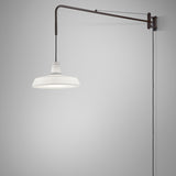 Marietta 32 A/98 outdoor wall light with a long bronze arm extending from a wall plate, suspending a pleated white cone shade on a cable, shown against a plain light grey background.