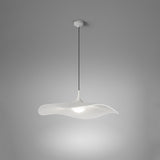 Mediterrània S/52 Ribbon LED pendant light with a white translucent wave-shaped shade, pleated texture, and black cable from a round ceiling canopy, shown against a grey background.