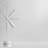 Tubino Aluminium LED Table Lamp in white, with angled cylindrical head, slim upright stem, arched cable detail and round base, shown on a plain white background.