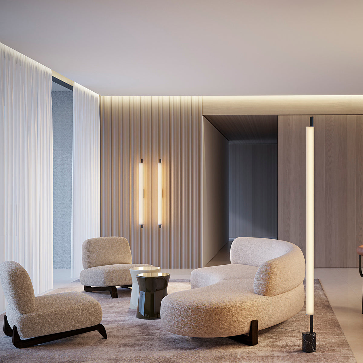Ombra Nero Marquina LED floor lamp in matt black, tall slim tube light beside a thin pole on a black veined marble base, shown in a modern living room.
