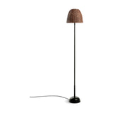 Atticus P/114 outdoor floor lamp with a woven brown bell-shaped shade on a slim stem and low domed base, shown against a plain white background.
