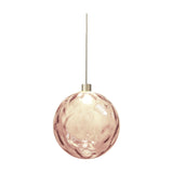 Murané pendant light with a 15cm rippled pink glass sphere, integrated LED, and slim cable suspension from a Brushed Champagne cap, shown on a plain white background.