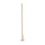 Hilow Line Travertine LED floor lamp with a slim brass aluminium rod rising from a round travertine base, shown against a plain white background.
