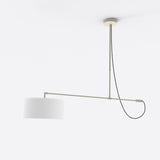 Raisa Fabric Drum Pendant Light in matt white, with a horizontal iron arm, white fabric drum shade, and looping cable, shown against a plain background.