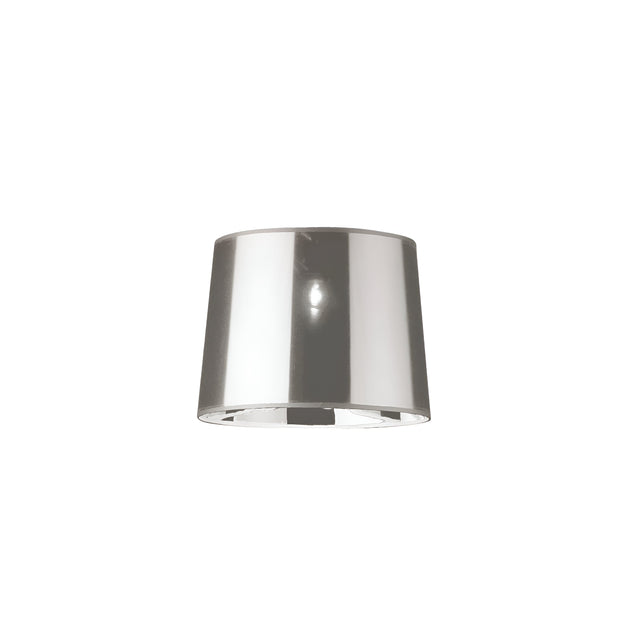 The Lucidia Lampshade - Chrome, with its smooth and reflective metallic finish, stands elegantly against a plain white background, showcasing its modern lighting appeal.