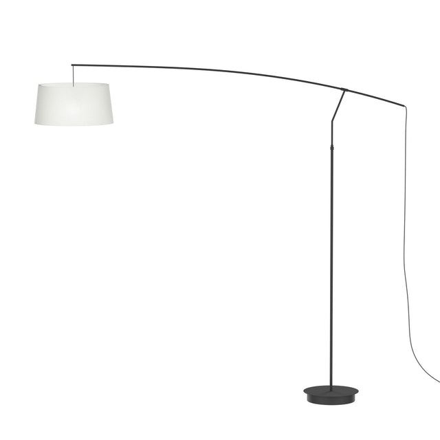 Raisa Fabric Drum Arc Floor Lamp in matt black, with a slim iron stem, curved overhanging arm, and white fabric drum shade, on a round weighted base against a plain white background.